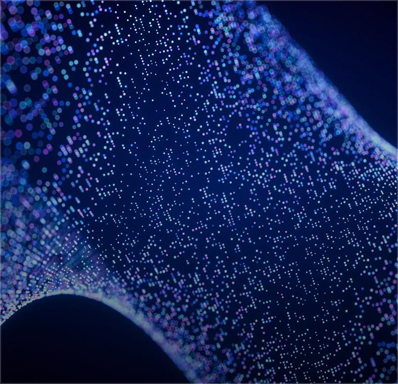Abstract image of a blue and purple network of shimmering lights forming dynamic wave patterns against a dark background.
