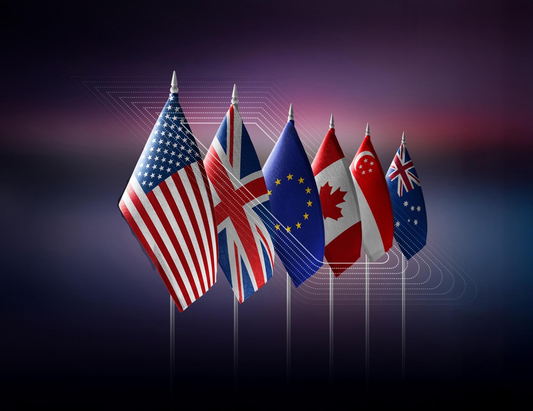 Flags of the USA, UK, EU, Canada, Singapore, and Australia on poles against a gradient purple background.